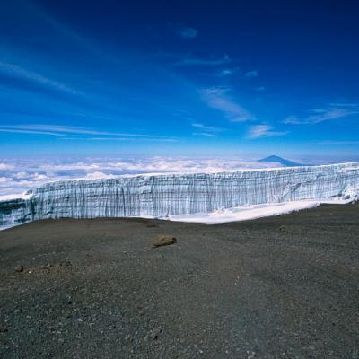 Tn Tanzania Kilimanjaro Southern Icefield Glacier Ice Cliff Near Summit And Blue Sky Mount Meru Behind